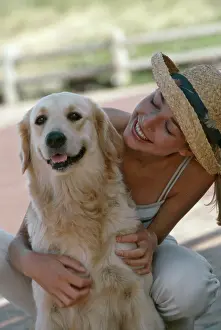 Choosing: Girl with Golden Retriever dog