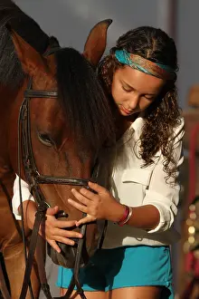Saddle: Girl harnessing his horse - Senegal