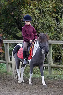 Bridles: Girl on a pony France