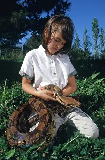 Holds: Girl with Snake