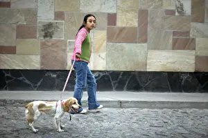 Promenade: Girl walking her Dog Arequipa city Peru