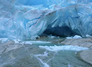 Nigardsbreen: Glacier opening - blue glacier ice and glacial