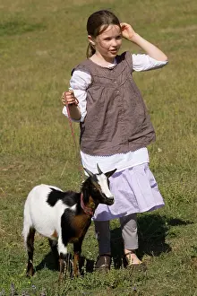 Jean-michel Labat: Goat - young girl with pygmy goat on lead