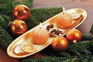 Candle: Golden bowl with round candles and Christmas atmosphere