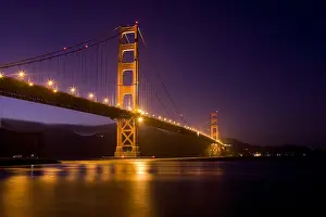 Francisco: The Golden Gate Bridge lit up at night from For