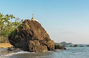 Myanmar: Golden stupa on rock at coastline, Ngapali Beach