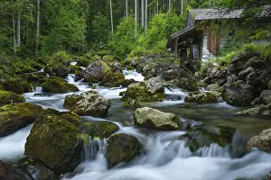 Typical: Golling watermill. Traditional mill in an alpine landscape