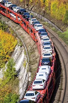 Cars: Goods train with new Mercedes cars on the Geislinger