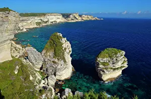 Sable: Grain du Sable, rugged chalk cliffs and turquoise-blue