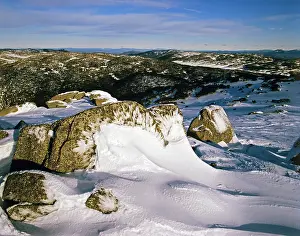 Blown: Granite boulders covered with wind-blown ice on
