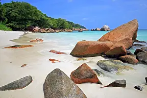 Exposure: Granite rocks and beach of Anse Lazio in the evening
