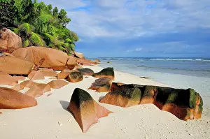 Destinations: Granite rocks on the sandy beach beach, La Digue