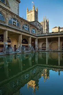 Traveller: Great Bath at the Roman Baths with the Bath Cathedral