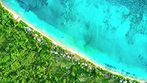 Houses: Green & Blue, Aerial view of the fishermen's bea