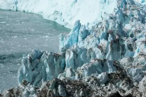 Eqip: Greenland, Ilulissat, Jagged blue ice face