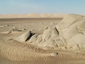 Torra: Grey-white rocks and sand dunes in the Namib Desert