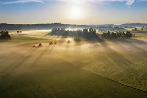 Foothills: Ground fog at sunrise, near Dietramszell, drone