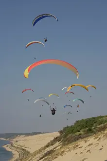 Bassin: Group of paragliders over the Bassin d'Arcachon