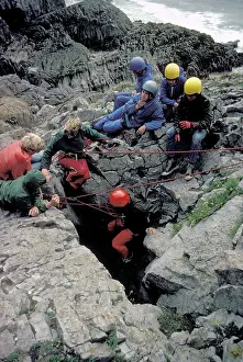 Hobbies: Group of young people caving