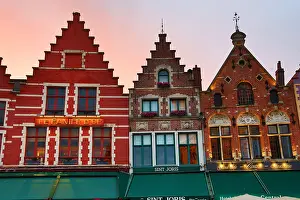 Brugge: Guild houses converted into restaurants at sunset