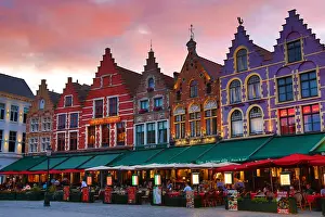 Brugge: Guild houses converted into restaurants at sunset
