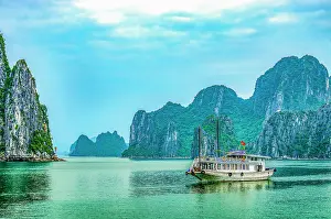 Limestone: Ha Long Bay, Vietnam. Wide angle landscape view of tourist