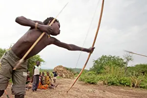 Nomads: Hadzabe Tribal Boys - with bow and arrow - less