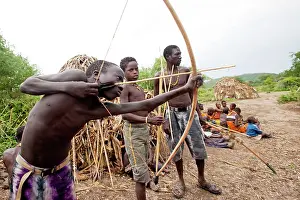 Nomads: Hadzabe Tribal Boys - with bow and arrow - less
