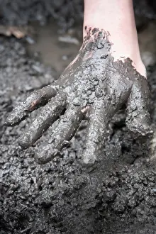 Relationship: Hand in mud