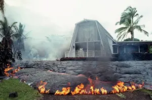 Volcanos: Hawaii Kilauea Volcano - home destroyed by lava flow