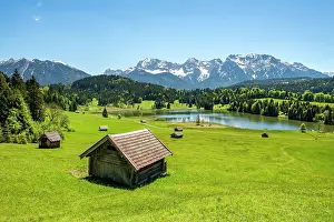 Foothills: Hay barn in a meadow at Geroldsee, view of Karwendel