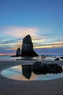 Seascape: Haystack Rock Pinnacles at low tide in Cannon Beach