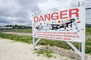 Plane: Hazard warning sign, Saint Martin airport, West