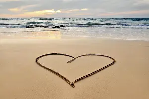 Character: Heart drawn on the tropical beach. Summer, trave