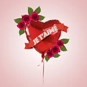 Text: Heart Shaped Hellium Balloon with roses leaves