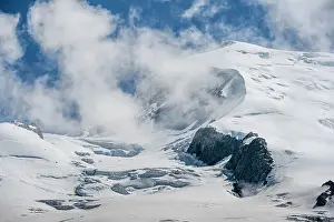 Avalanche: High alpine mountain landscape, clouds on the summit