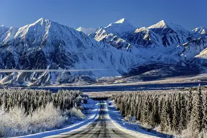Highway: Highway in winter landscape in front of snow-covered