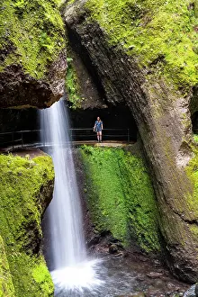 Erode: Hiker at Levada do Moinho, Waterfall in a gorge
