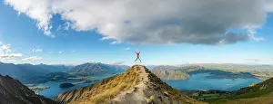Mountaineer: Hiker takes a skydive, views of mountains and lake