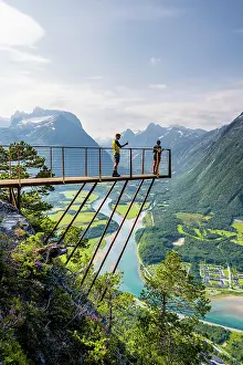 Platform: Hikers standing on viewing platform Rampestreken