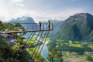 Platform: Hikers standing on viewing platform Rampestreken