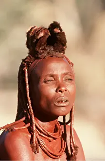 Dress: HIMBA WOMAN - leather headress used as symbol of
