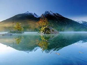 Berchtesgaden: Hintersee with morning fog at sunrise, water reflection