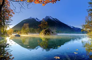 Berchtesgaden: Hintersee with morning fog at sunrise, water reflection