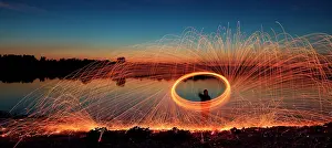 Hour: A hoarfrost with sparks at a lake, blue hour, glowing
