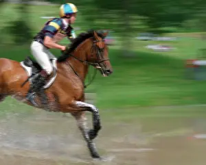 Trials: Horse and Jockey - Completing a water jump during