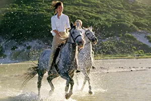 Owners: Horse riders on lagoon