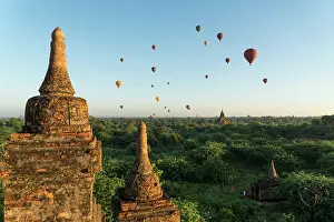 Myanmar: Hot air balloons over temples and pagodas, Bagan