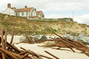 Defences: Houses on cliff edge and remains old sea defences