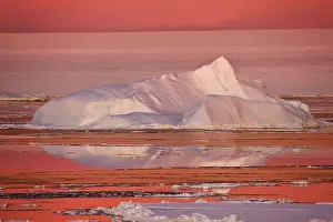 Floes: Huge iceberg and ice floes in the ocean
